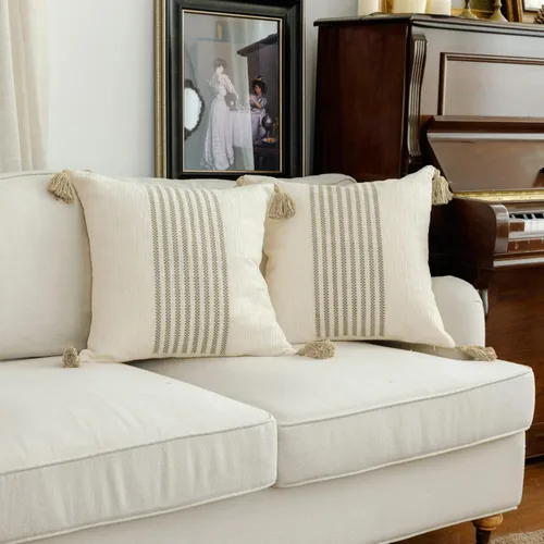 IKATYARN Juego de 2 fundas de almohada de felpilla suave con borlas, 18 x 18 pulgadas, color beige y blanco roto bordados, funda de cojín moderna