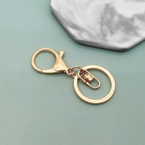 Miniatura 6 de 30 llaveros dorados con cierre de langosta para la fabricación de joyas, cierre de langosta de metal, clips de gatillo giratorios con cierres