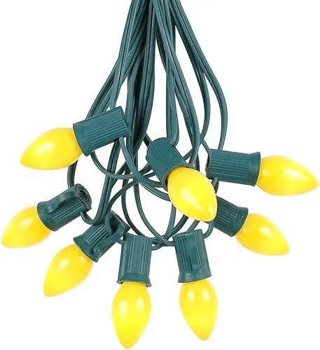 Novelty Lights C7 - Juego de luces navideñas de cerámica amarilla, tira de luces para interiores y exteriores, bombillas opacas, cable verde, 25