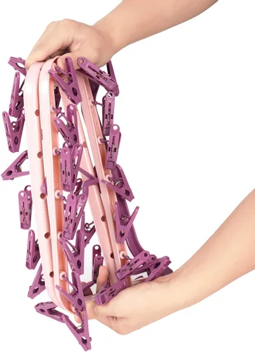 Miniatura 4 de Foshine Percheros de secado de ropa plegables con ganchos de clip de plástico y 32 clips de secado a prueba de viento, colgador de ropa interior Rosa