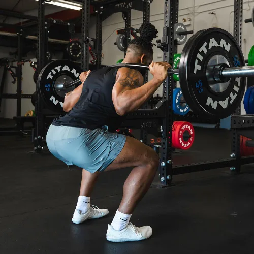 Miniatura 6 de Titan Fitness Barra eléctrica Yukon de óxido negro, barra olímpica de 96 pulgadas con curvatura de 6 pulgadas para mayor comodidad durante