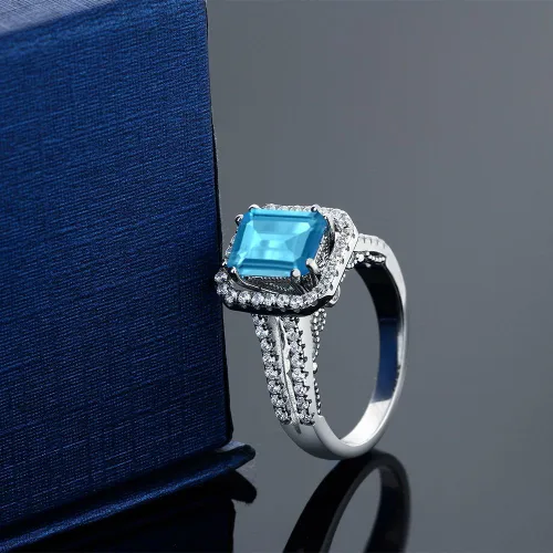 Miniatura 5 de Gem Stone King Anillo de compromiso de plata de ley 925 con topacio azul suizo para mujer