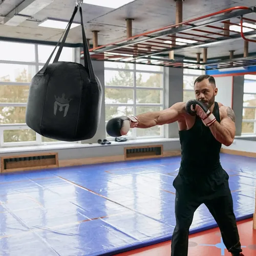 Miniatura 6 de Meister Bolsa pesada de bola de demolición llena de 60 libras para boxeo y MMA - Negro