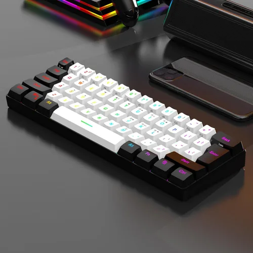 Miniatura 7 de 7KEYS Mini teclado para juegos con 60% con cable, 14+ modos de iluminación RGB, 25 teclas, sensación mecánica anti-fantasma, portátil ultra compacto