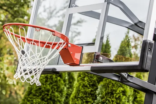 Miniatura 7 de Silverback Aro de baloncesto de altura ajustable en el suelo con tablero de vidrio templado, borde de separación profesional y almohadilla de tablero