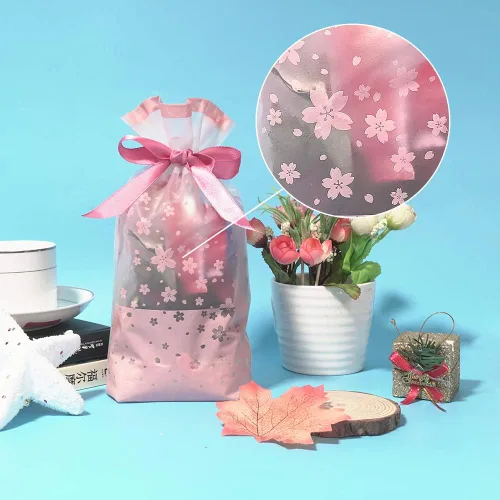 Miniatura 6 de SumDirect Bolsas de regalo de plástico rosa con cordón – 50 bolsas de regalo de 6 x 9 pulgadas, bolsas de regalo de flor de cerezo para fiesta
