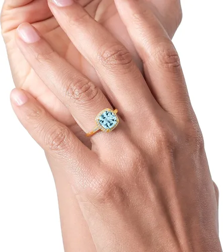 Miniatura 4 de Gem Stone King Anillo de compromiso de oro amarillo de 10 quilates con topacio azul cielo y diamante para mujer