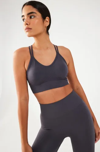 Miniatura 4 de COMEUP Sujetador deportivo sin costuras con tiras para mujer, almohadillas extraíbles en el pecho. Sujetador deportivo de soporte medio