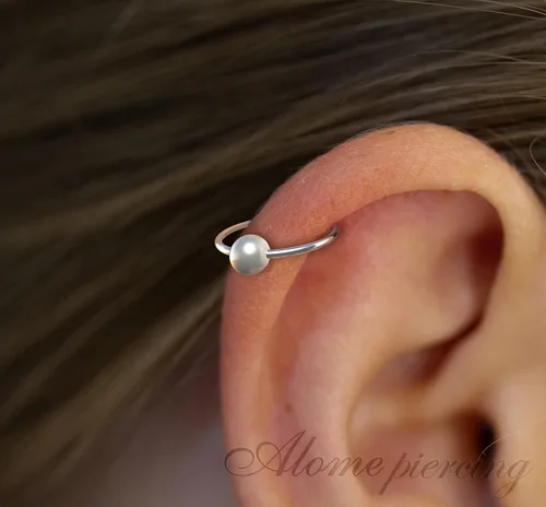 Miniatura 7 de Variedad de aretes de aro para cartílago