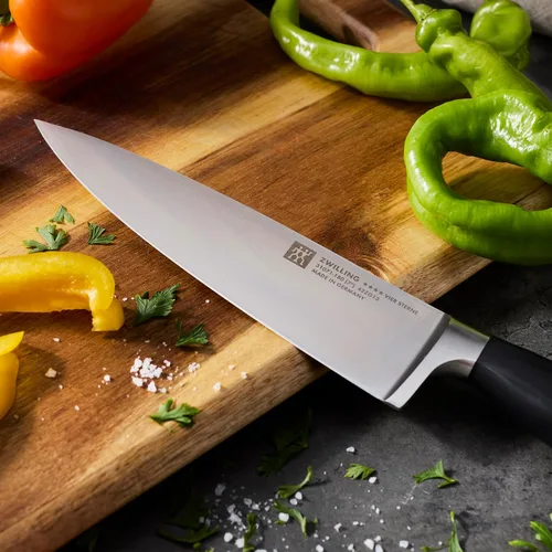 Miniatura 5 de ZWILLING Cuchillo de chef Four Star de 7 pulgadas