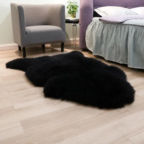 Woolous Alfombra de piel de oveja negra, Nueva Zelanda, auténtica, de piel natural, esponjosa, para dormitorio, sala de estar (piel individual, 2 x