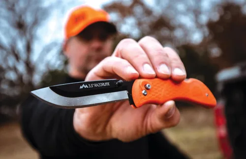 Miniatura 6 de Cuchillos Outdoor Edge RazorPro L de caza con cuchilla reemplazable de afeitar ultraafilada, mango naranja antideslizante TRP, funda para cinturón