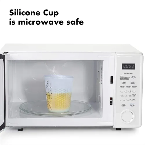 Miniatura 3 de 1 taza de medir de silicón para exprimir y verter, con patrón Stay-Cool, de la marca Oxo Good Grips, Transparente