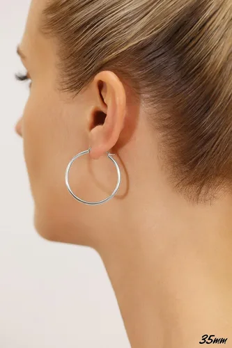 Miniatura 3 de Aretes redondos clásicos de oro blanco de 14K sin extremos