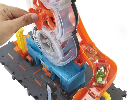 Miniatura 4 de Hot Wheels City Super Twist Tire Shop - Juego de tienda de neumáticos con giro de llave para hacer viajar los autos a través de los neumáticos