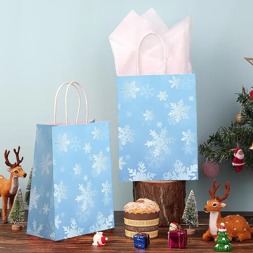 Miniatura 5 de Jectivs Paquete de 24 bolsas de regalo para fiestas, bolsas grandes y gruesas de papel kraft blanco con copos de nieve azul hielo con tejido blanco