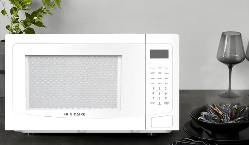 Miniatura 7 de Frigidaire Microondas de 1.1 pies cúbicos de 1000 vatios, color blanco