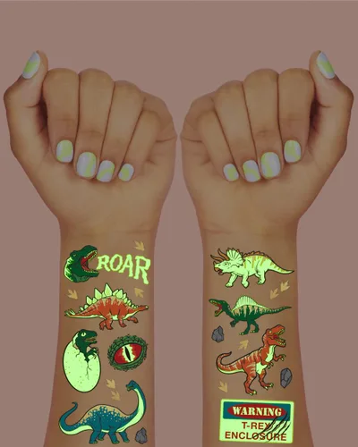 Miniatura 3 de xo, Fetti Tatuajes temporales de dinosaurios - 44 piezas que brillan en la oscuridad Suministros para fiesta de cumpleaños, recuerdos de fiesta