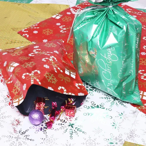 Miniatura 6 de WesGen Bolsas de regalo de Navidad, 32 bolsas de regalo de Papá Noel en 4 tamaños y 4 diseños con lazos de cinta y etiquetas para envolver