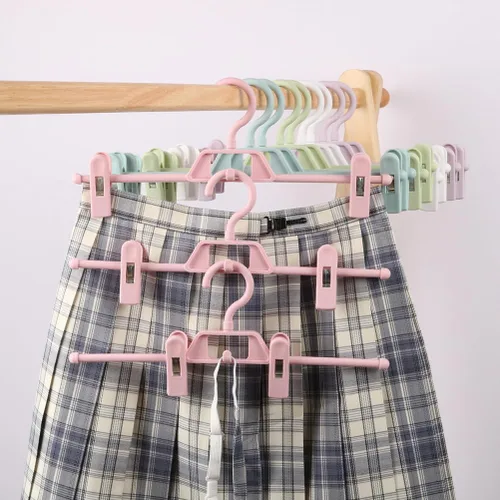 Miniatura 7 de DOITOOL Paquete de 10 perchas antideslizantes rosas para pantalones con clips ajustables, clips de plástico retráctiles para el hogar
