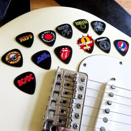 Miniatura 3 de Juego de púas de guitarra de 12 álbumes clásicos para cada guitarrista. Impresión a doble cara. Púas de 0,46, 0,71, 0,81, 0,88, 0,96 y 1,2 mm