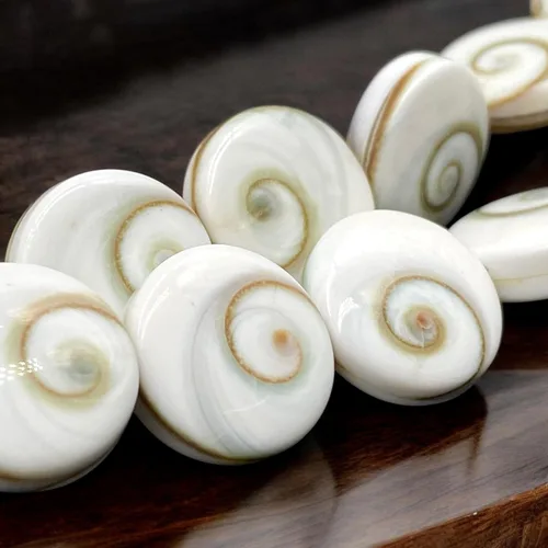 Miniatura 6 de ABCGEMS Shiva Eye Shell Beads Indonesia Auténtica Región Indo-Pacífico (patrón geométrico de matriz de doble cara) de origen ético – Producción