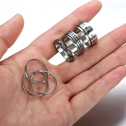 Miniatura 6 de Jstyle Juego de 4 anillos de acero inoxidable para mujeres y hombres, anillos giratorios de flores, luna, estrella, anillos frescos para aliviar