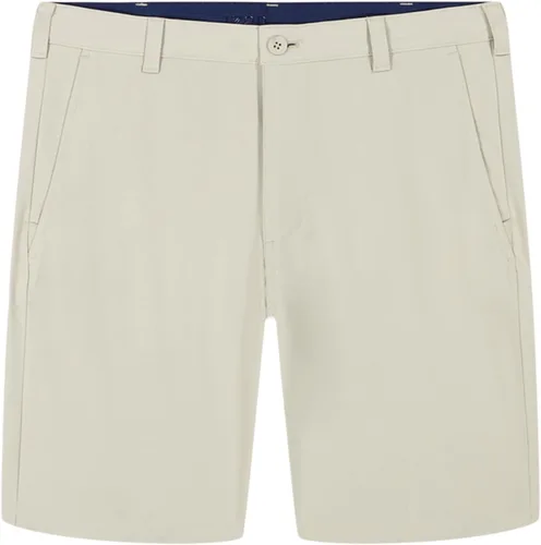Miniatura 4 de IZOD - Pantalones cortos de golf Swingflex de 9.5" para hombre, elásticos, corte recto