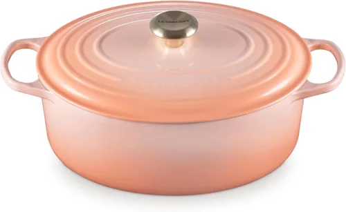 Miniatura 17 de Le Creuset Horno holandés ovalado Signature de hierro fundido esmaltado, 2.75 cuartos de galón., Blanco