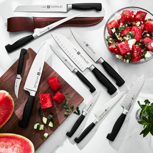 Miniatura 3 de ZWILLING J.A. Henckels Twin Four Star Santoku de borde hueco de 5.5 pulgadas Negro/ acero inoxidable