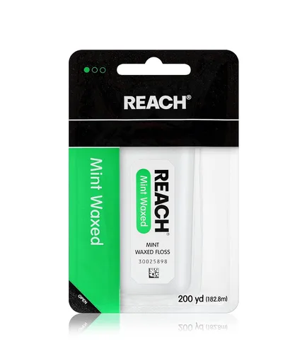 Reach Hilo dental encerado | Eliminación efectiva de placa, superficie de limpieza extra ancha | Resistencia a la trituración y tensión, se desliza