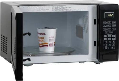 Miniatura 5 de Horno microondas West Bend WBMW92B de 900 vatios, compacto con 6 configuraciones pre-cocción, descongelamiento rápido, panel de control electrónico