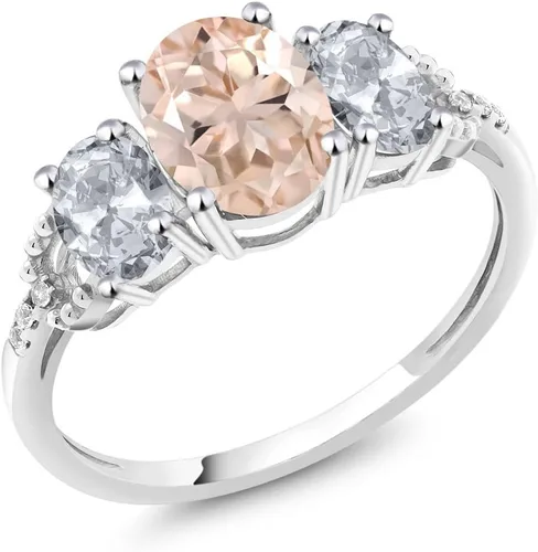 Miniatura 40 de Anillo de compromiso ovalado de oro blanco de 10 quilates con piedra natal y topacio blanco de 3 piedras con detalles de diamante Centro de 0.315