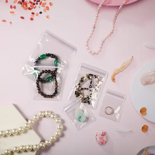 Miniatura 5 de Clabby 120 bolsas de joyería de PVC transparente, bolsa de almacenamiento de joyas de plástico, anillos transparentes, aretes, bolsas antideslustre