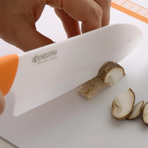 Miniatura 2 de Kyocera Ceramic Revolution - Cuchillo utilitario de 4.5 pulgadas, mango naranja, hoja blanca