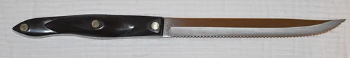 Miniatura 2 de CUTCO Modelo 1729 Petite Carver...............Hoja dentada de doble D® de 6¾"; mango marrón clásico de 5½" ("negro") en bolsa de plástico sellada