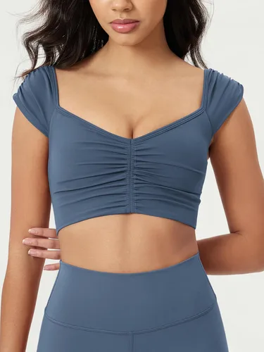 Miniatura 17 de ODODOS Camiseta corta sin mangas con cuello en V y frente fruncido para mujer, recortada en la espalda, manga casquillo