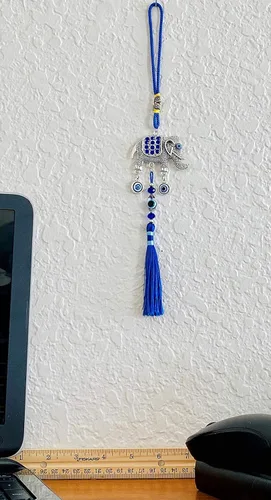 Miniatura 5 de LUCKBOOSTIUM Adorno único y elegante de elefante feliz con cristal azul y borla colgante de protección espiritual para la salud y la buena suerte
