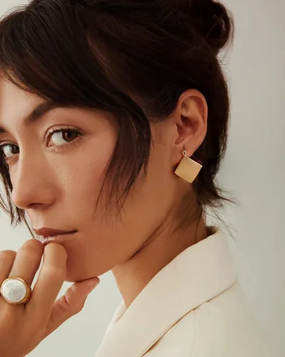 Miniatura 4 de Delicados aretes colgantes dorados para mujer