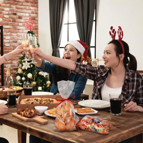 Miniatura 7 de Boao 100 piezas de bolsas de celofán para golosinas de Navidad con copos de nieve, bolsa de dulces con cinta para suministros de fiesta de Navidad
