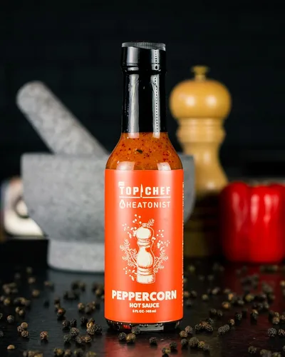 Miniatura 2 de Bravo's Top Chef - Salsa picante de pimienta de Heatonist, celebra la 20ª temporada de Top Chef con calor de pimiento asado al fuego, habaneros