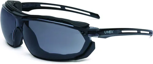 Uvex Honeywell Home UVEX by S4041 Tirade - Gafas de seguridad selladas con marco negro, lente gris y revestimiento antivaho Uvextra, negro/gris
