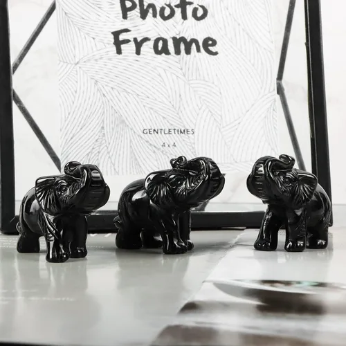 Miniatura 6 de Artistone Estatua de elefante de cristal de obsidiana negra, escultura de animales tallada a mano para decoración del hogar, adornos de escritorio