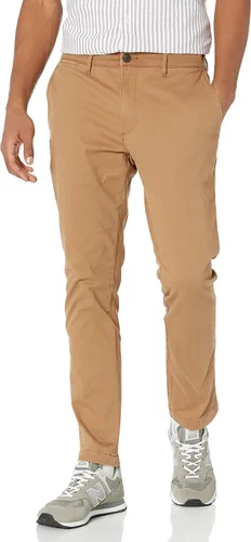 Tienda Essentials Pantalón chino elástico ajustado para hombre (anteriormente Goodthreads)