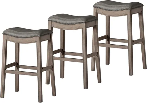 Miniatura 43 de Maven Lane Adrien Taburete de bar sin espalda, asiento de silla de montar de 31 pulgadas con reposapiés, marco de madera maciza gris y tapicería