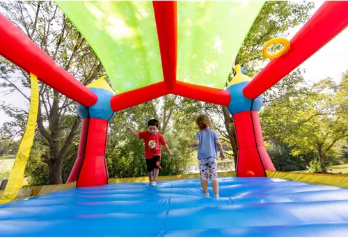 Miniatura 5 de Castillo hinchable de fiesta Bounceland, casa saltarina, 16 pies de largo x 13 pies de ancho x 10.3 pies de alto, aro de baloncesto, techo solar