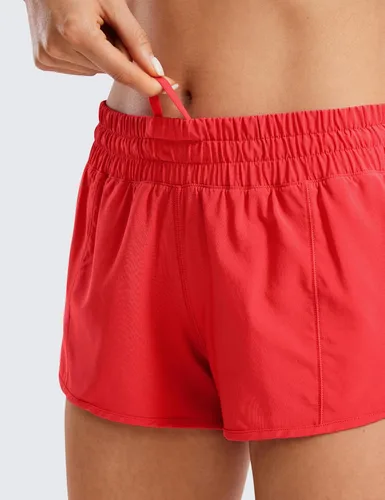 Miniatura 3 de CRZ YOGA Pantalones cortos de correr para mujer de cintura baja de 2.5 pulgadas, forro de malla de secado rápido para gimnasio, entrenamiento