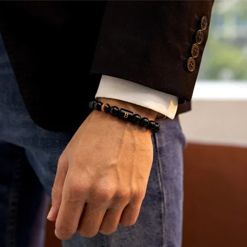 Miniatura 8 de Brazalete hecho a mano con letra inicial del nombre, las cuentas son de ónix negro u ojo de tigre, la cuerda es trenzada, un brazalete lleno