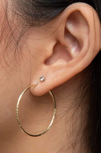 Miniatura 3 de Aretes de aro sin fin continuo de oro amarillo de 14 quilates con corte de diamante (tubo de 0.049 in)