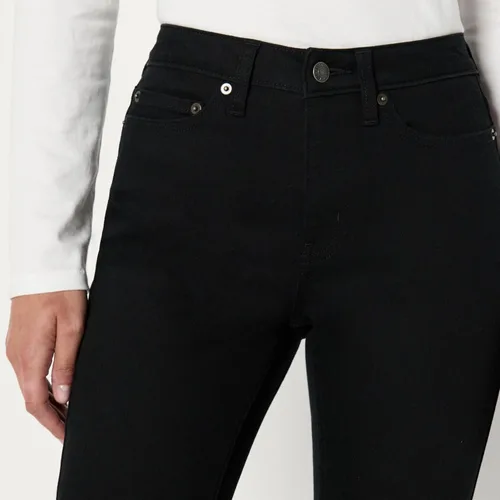 Miniatura 5 de Amazon Essentials - Jeans ajustados de tiro medio para mujer, altamente elásticos y versátiles